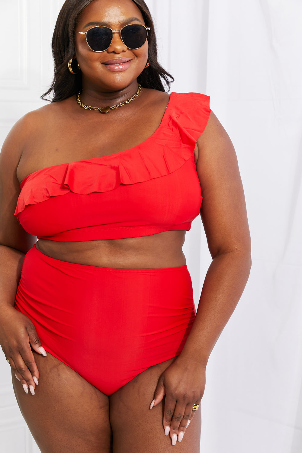 Red color swimwear with ruffle detail