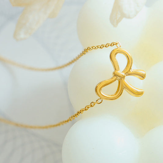 Elegant Gold-Plated Titanium Steel Bow Pendant Necklace