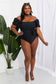 Salty Air black one-piece with trendy puff sleeves
