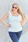 Simple white tank with broad shoulder straps